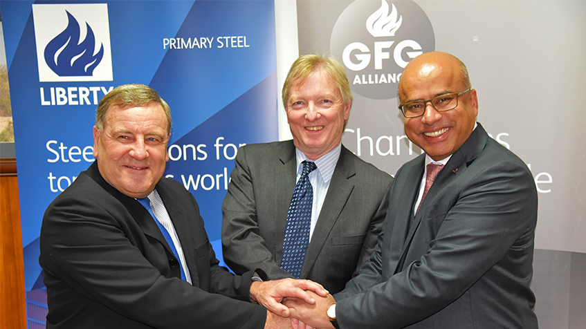 Image Caption: Havilah Resources Limited Executive Director Technical, Chris Giles, left, and Chairman Mark Stewart, celebrate the signing of the agreement with GFG Alliance Executive Chairman, Sanjeev Gupta.